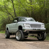 Front view of 2001-2002 chevy 2500-3500 with a custom grille on it from overkillfab