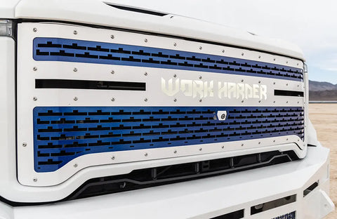Customizable stainless steel LED grille for 2020-2023 GMC 2500-3500 trucks with blue backglow and Overkill Fab branding.