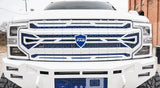 A custom grille for a Ford Super Duty truck featuring a unique mesh design and the Overkill Fab logo, made from lightweight aluminum.